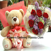 Bunch Of 7 Red Roses And A Medium Sized Cute Teddy Bear Delivered in Russia