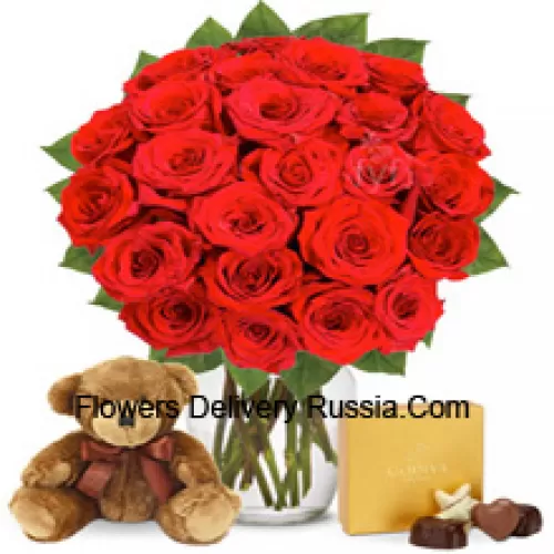 31 Red Roses With Some Ferns In A Glass Vase Accompanied With An Imported Box Of Chocolates And A Cute 12 Inches Tall Brown Teddy Bear