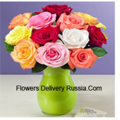 11 Mixed Colored Roses With Some Ferns In A Vase