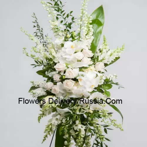 A Beautiful Sympathy Flower Arrangement That Comes With A Stand
