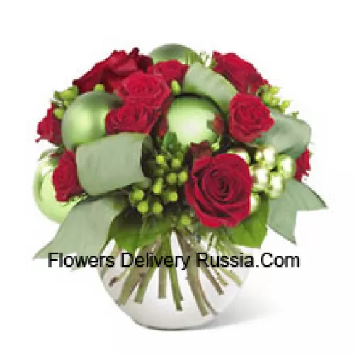 This new holiday bouquet combines festive red roses, spray roses and more with bright green ornaments and seasonal accents for a classic look with a contemporary new twist!  (Please Note That We Reserve The Right To Substitute Any Product With A Suitable Product Of Equal Value In Case Of Non-Availability Of A Certain Product)